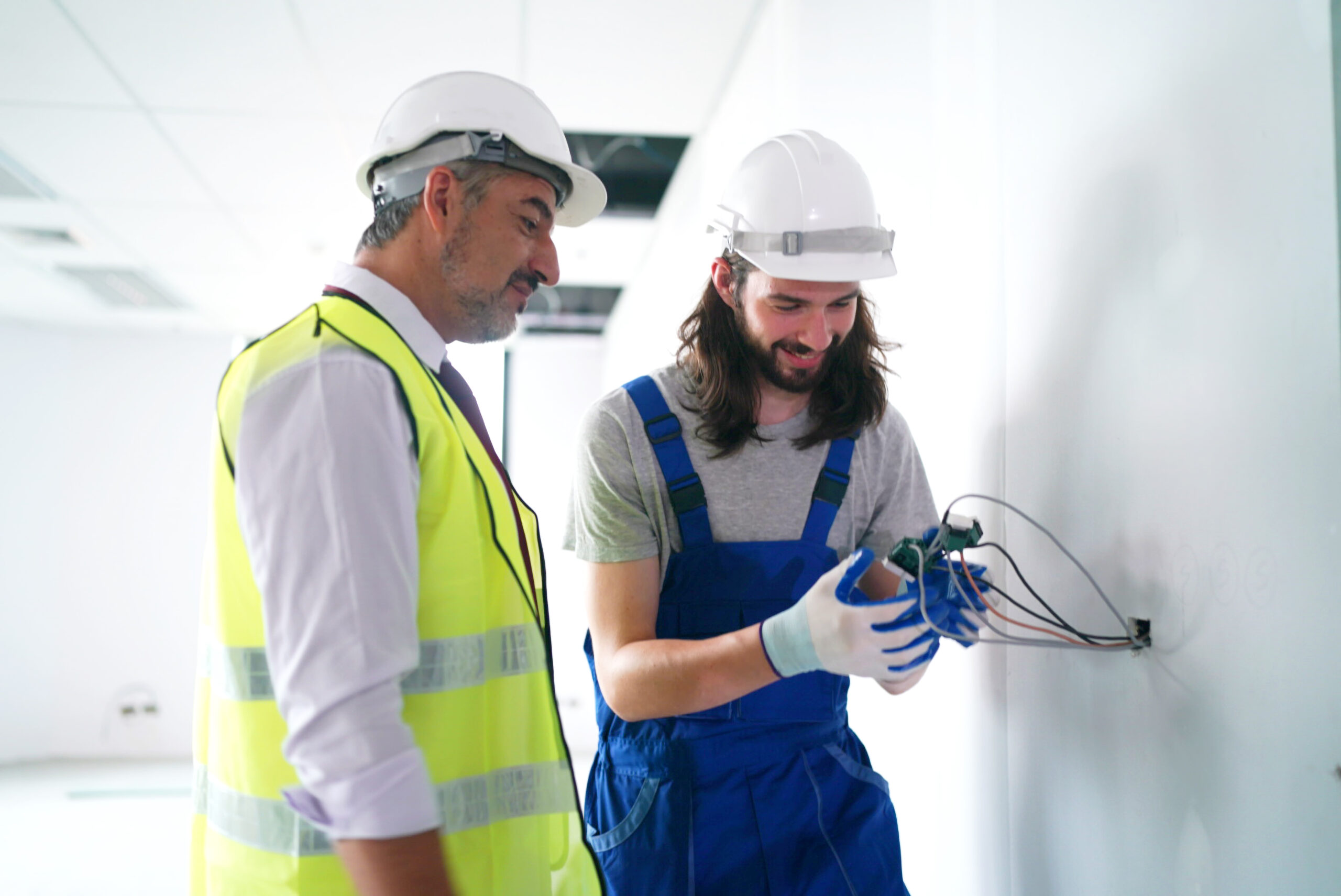 White card requirements for electricians - Architect and construction engineer or surveyor discussion plans and blueprints